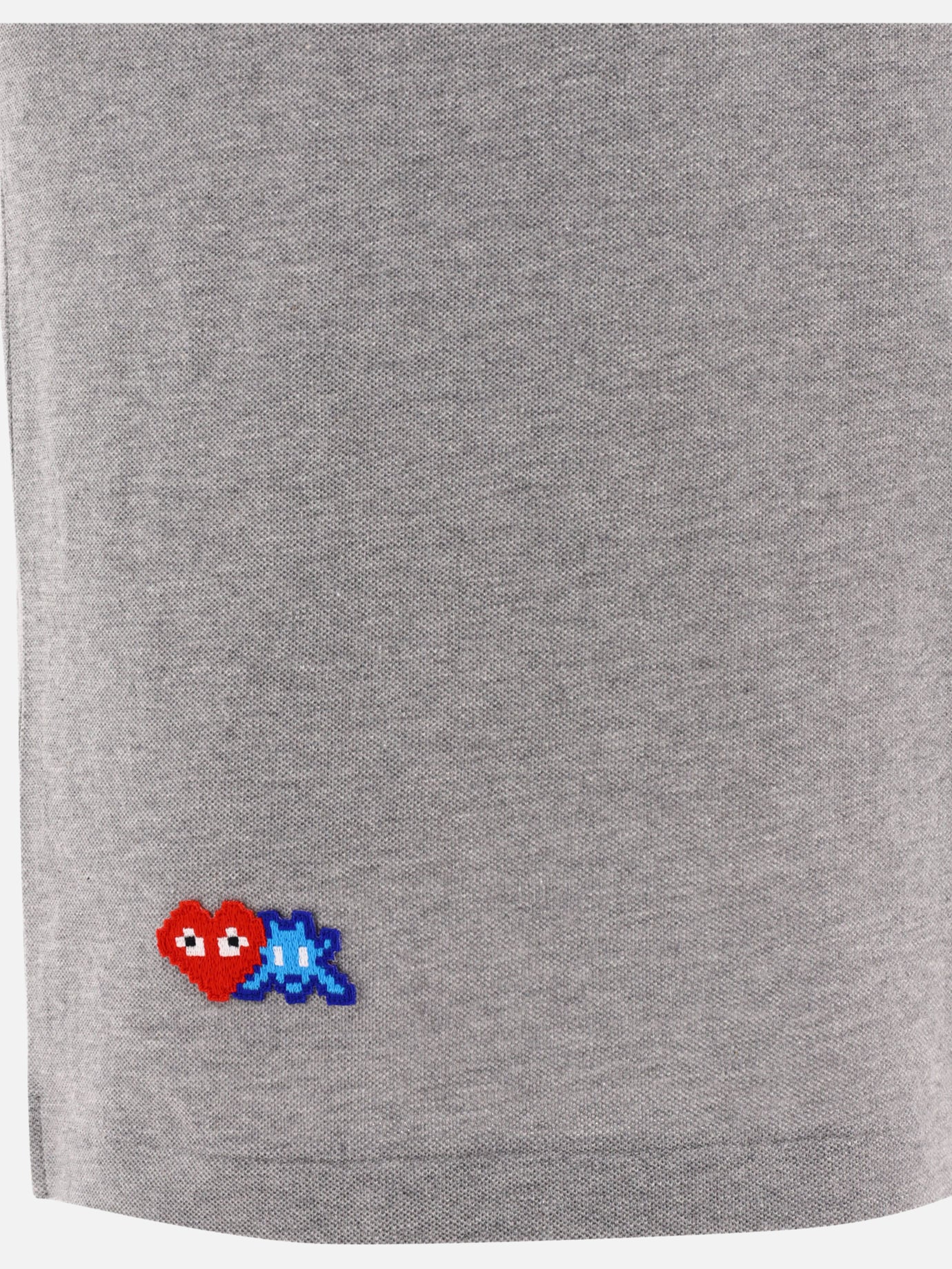 "Comme des Garçons x Invader" polo shirt