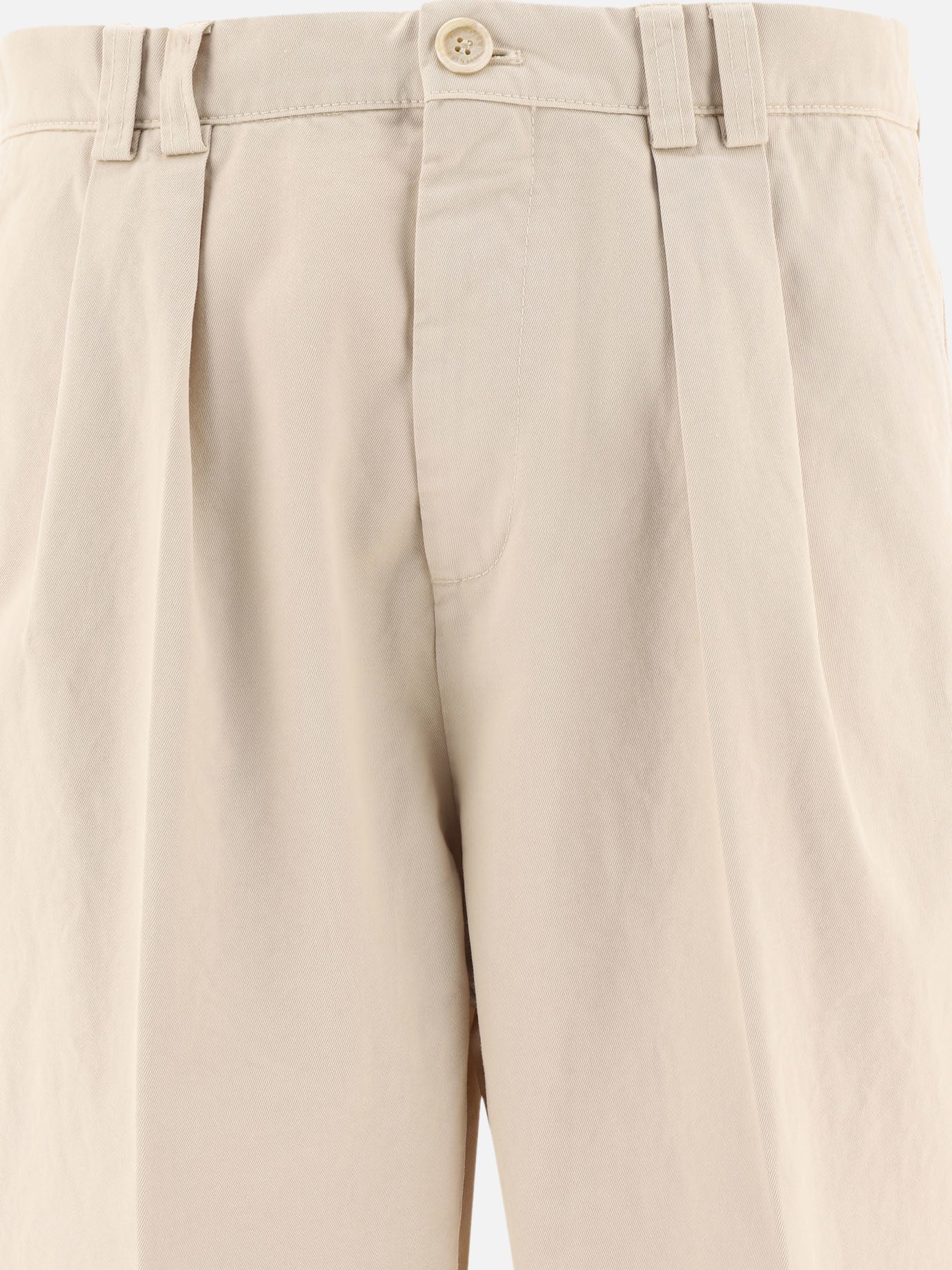 Trousers with reversed double pleats