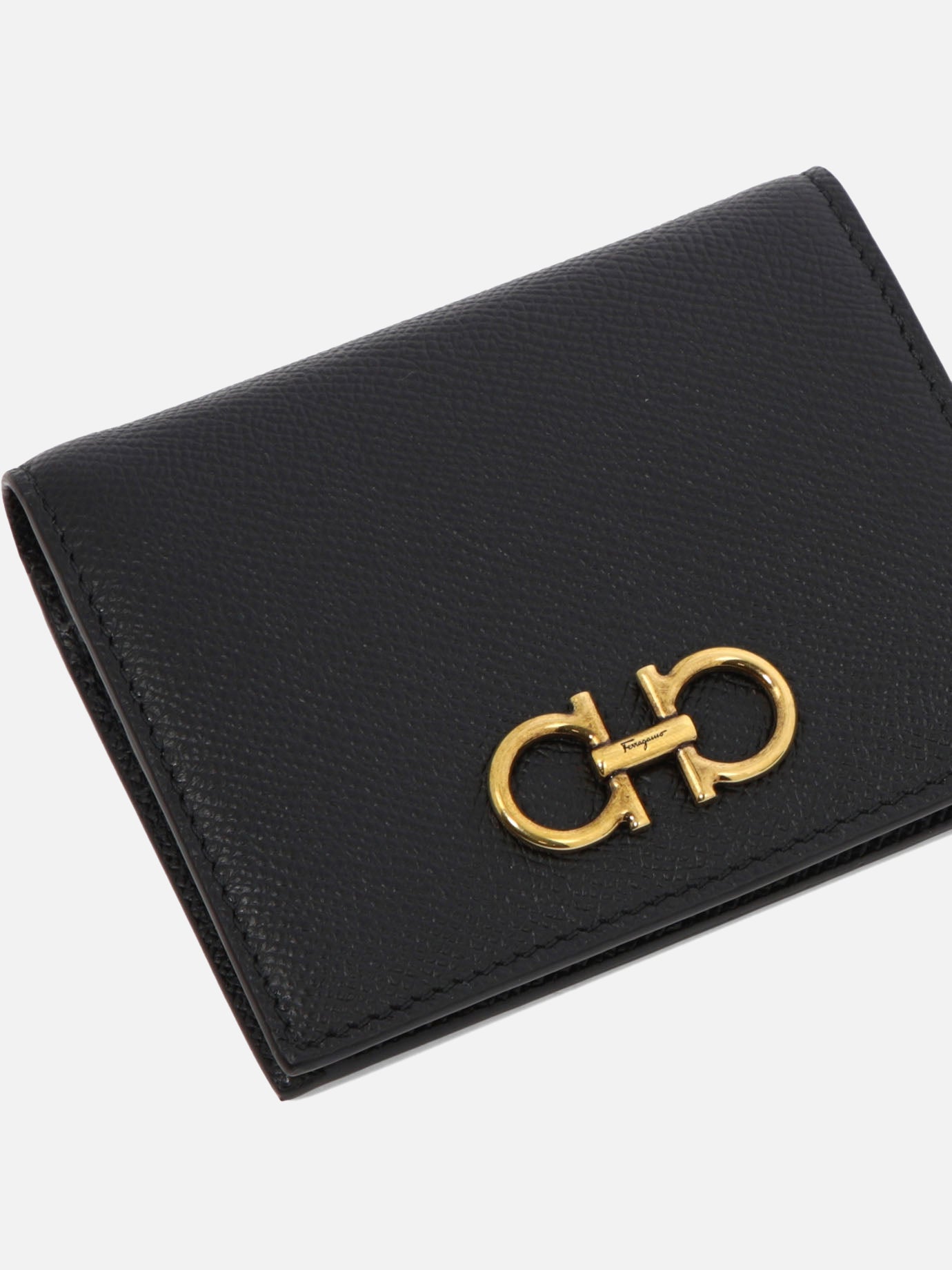 "Gancini" compact leather